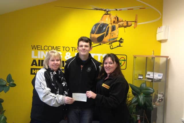 The Lincolnshire Landrover Club recently presented a cheque to the Lincolnshire and Nottinghamshire Air Ambulance.
