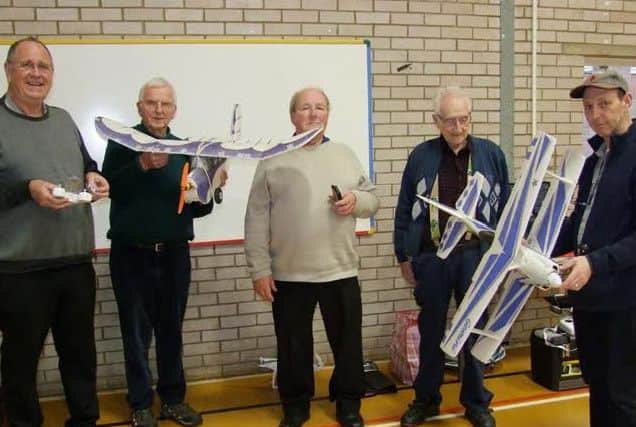 Members of the model Flying Club EMN-170604-152112001