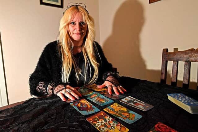 Tarot cards at the ready: The Rev Shelley Mayes at her recently opened shop in West Street, Horncastle. Photo: John Aron