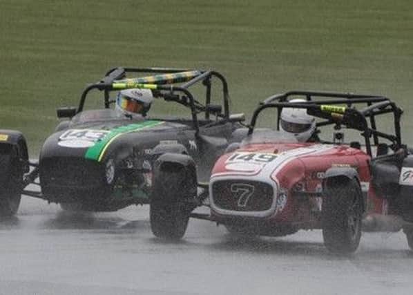 Molsom and White battling for position at a very wet Oulton Park. Photo: Hazel Ford.