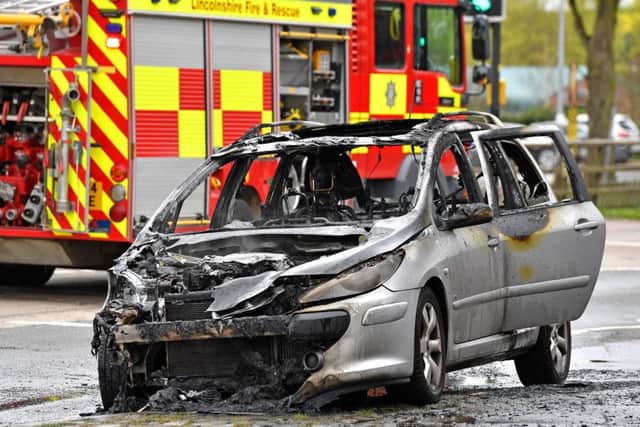 Fire crews tackled a vehicle fire on the A158 in Horncastle today (Monday). Photo: John Aron.