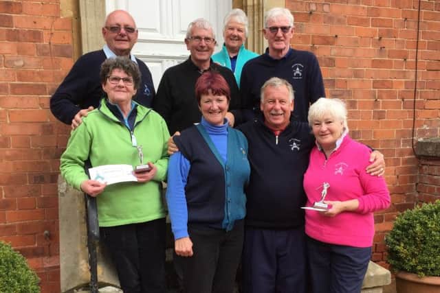 The J and M Trophy raised more than Â£330 for  the captains charities. From left, back  Martin Sizer, Robert Houlton, Jean Sizer, mens captain John Teanby; front  Lesley Walmsley, lady captain Andrea Smaggasgale, seniors captain Malcolm Bood, Lynda Cahalin EMN-171004-161739002