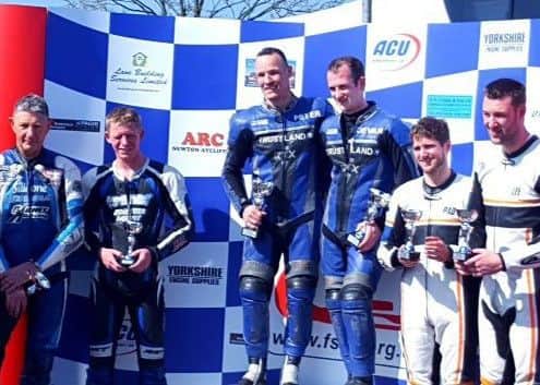 The defending champions on familiar territory on the top step of the podium EMN-171204-173554002