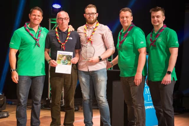 Steve Backshall, Scout ambassador, Robin Wright, county commissioner, James Baker, county youth commissioner, Mark Tarry, deputy UK chief commissioner.