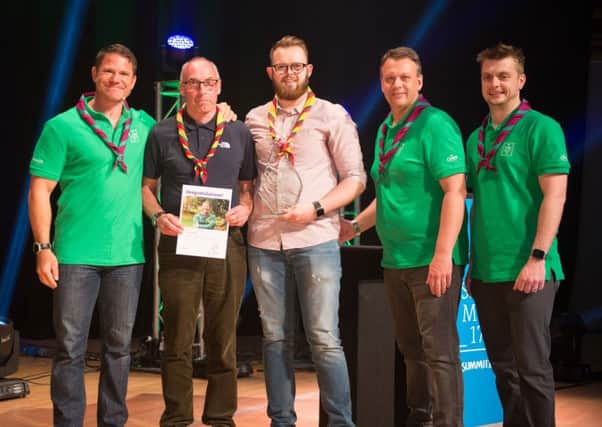 Steve Backshall, Scout ambassador, Robin Wright, county commissioner, James Baker, county youth commissioner, Mark Tarry, deputy UK chief commissioner.