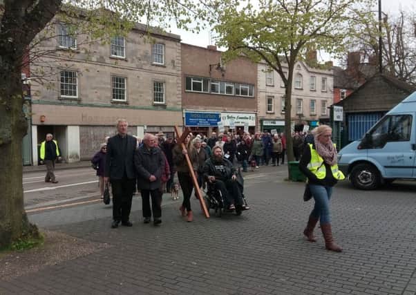 The Walk of Witness arrives in Sleaford Market Place for the church service. EMN-170414-124547001