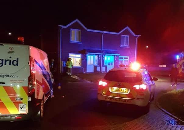 Police at the scene where a car was in collision with a property in Hickory  Way, Mablethorpe. ANL-170417-070728001
