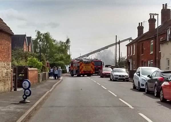 Fire services at the house blaze in Billingborough on Saturday. Photo by Bourne and Billingborough Neighbourhood Policing Team. EMN-170417-100117001