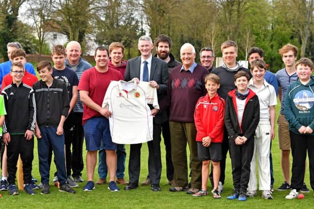 Horncastle CC captain Rob Bee, Chattertons partner Rob Alcock and club president Michael Paige are joined by young members.