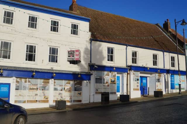 The old Co-op building in Caistor Market Place EMN-170428-083849001