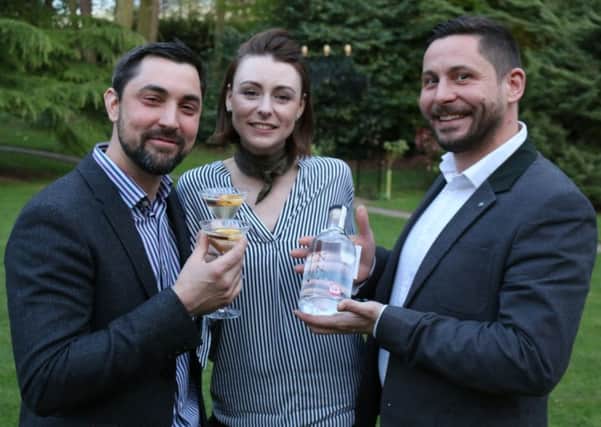 Louth couple Alan Bottomely and Amy Conyard have produced Lincolnshires first gin brand, pictured with chef Steven Bennett.