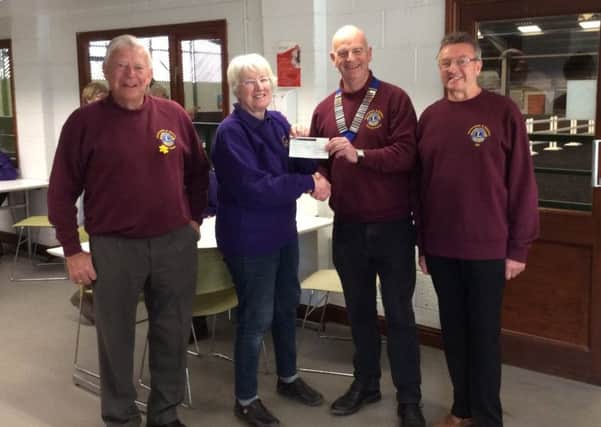 Horncastle Lions Club President Steve Flood presented a cheque for ?500 to Janet Viner, Chair of the Lincolnshire Wolds Riding for the Disabled Club EMN-170424-111232001