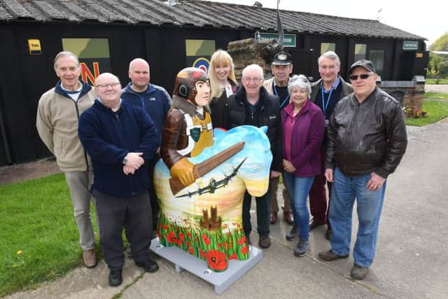 Knight of the Skies from the Lincoln Knights Trail visiting Metheringham Airfield Visitor Centre. Committee members and trustees of Friends of Metheringham Airfield L-R David Thomas, Rod Sanders, Tim Taylor, Jacquie Marson, Jeff Williams, Dick Roberts, Pam Thomas, Andy Marson, John Shipton. EMN-170424-120648001