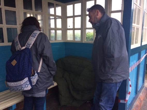 P3 outreach support worker Lauren Gilbertson and seniour worker Andy Lee chat to a rough sleeper in a bus shelter on South Parade in Skegness. ANL-170413-111227001