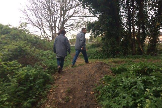 P3 outreach support worker Lauren Gilbertson and seniour worker Andy Lee search the dunes at the north end of Skegness. ANL-170413-111150001