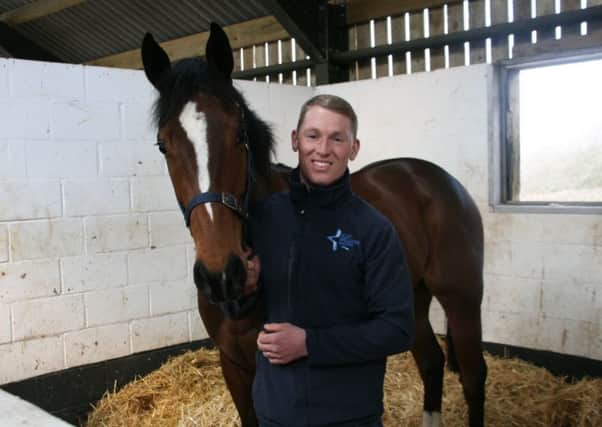 Nettleton trainer Olly Williams with his stable star Tricky Dicky as he looks ahead to the new season EMN-170424-152452002