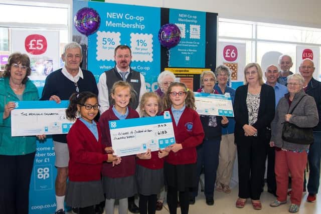 The three causes given money by the Mablethorpe Co-operatve Food Store.