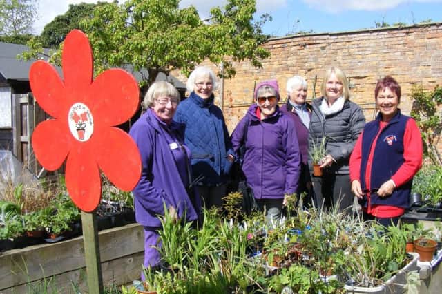 Sleaford In Bloom members and visitors enjoy the plant swap and coffee morning. EMN-170425-115337001