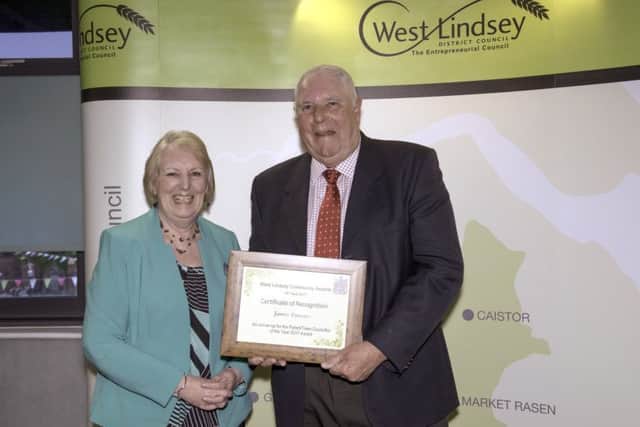 West Lindsey Community Awards 2017, pictured is James Cousins receiving his award as runner-up for the Parish/Town Councillor of the Year from Coun Sheila Bibb EMN-170425-115459001