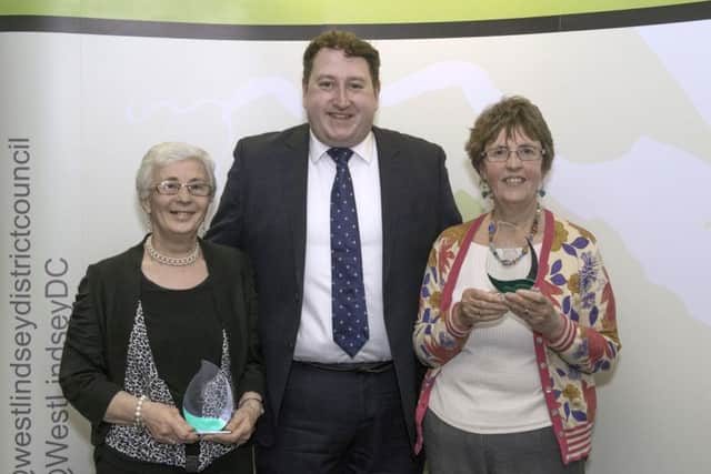 West Lindsey Community Awards 2017, pictured are Mrs Sue Rawson and Mrs Sandra Forman receiving their award for Community Group of the Year from Coun Giles McNeill EMN-170425-115534001