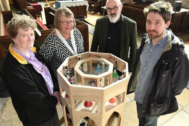 Heckington parish church hosting a special exhibition. L-R Chris Cullen, Becky Carr, John Bowers and Tim Shaw with Plain Changes exhibit. EMN-170105-141936001