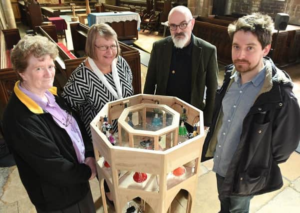 Heckington parish church hosting a special exhibition. L-R Chris Cullen, Becky Carr, John Bowers and Tim Shaw with Plain Changes exhibit. EMN-170105-141936001