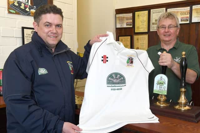 Heckington Cricket Club's new kit sponsor, 8 Sail Brewery. They have also brewed a special beer for them. From left - Heckington cricket captain Tony Carter with 8 sail brewery owner Tony Pygott. EMN-170205-112050001
