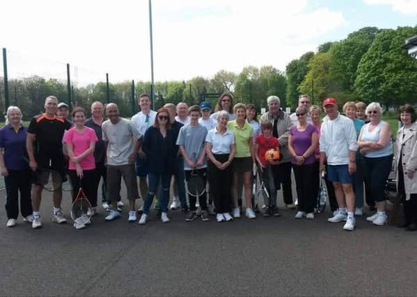 Sleaford Tennis Club members with Syds family EMN-170428-154518002