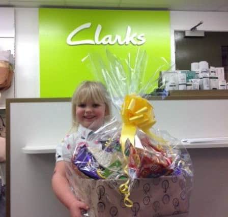 Emilie Guilliatt (age 6) won the Clarks hamper of goodies for finding 12 pictures of bikes hidden around the Louth store.