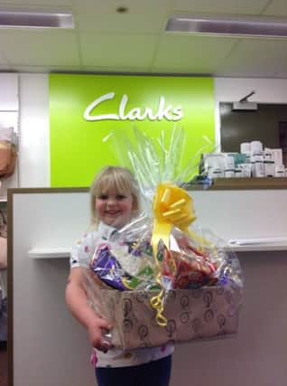 Emilie Guilliatt (age 6) won the Clarks hamper of goodies for finding 12 pictures of bikes hidden around the Louth store.