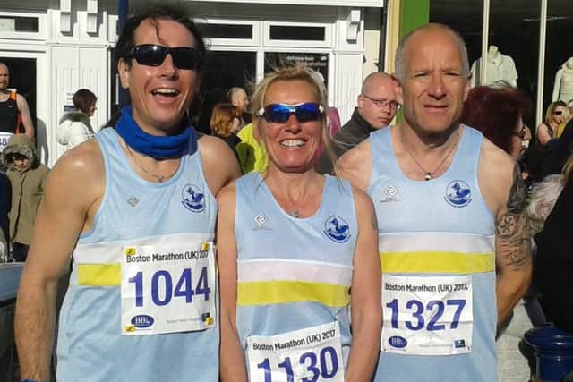 Mablethorpe Running Club trio, frm left, Roger Blake, Paula Downin and Mike Nelhams at the Boston Marathon (UK) EMN-170426-173637002
