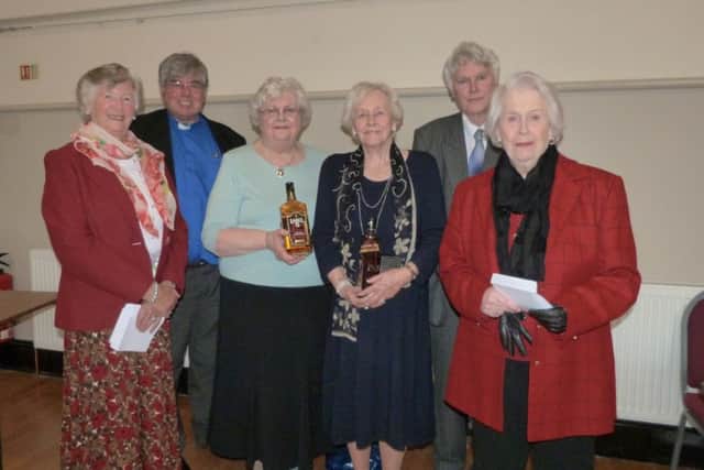 The Rev Canon Ian Robinson with drive director Guy Grainger,second placed Margaret Williams, left, and Carol Henderson, far right, and winners Sylvia Smith and Jean Holgeth, winners. (Photo by Linda Oxley) EMN-170305-153224001