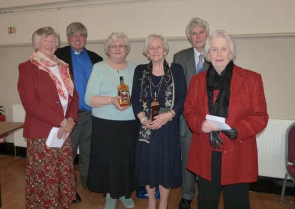 The Rev Canon Ian Robinson with drive director Guy Grainger,second placed Margaret Williams, left, and Carol Henderson, far right, and winners Sylvia Smith and Jean Holgeth, winners.  (Photo by Linda Oxley) EMN-170305-153224001