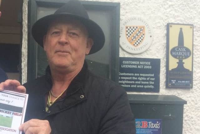 Save Burgh Cricket Field campaigner Dave Poole outside the Fleece Inn. ANL-170805-103831001