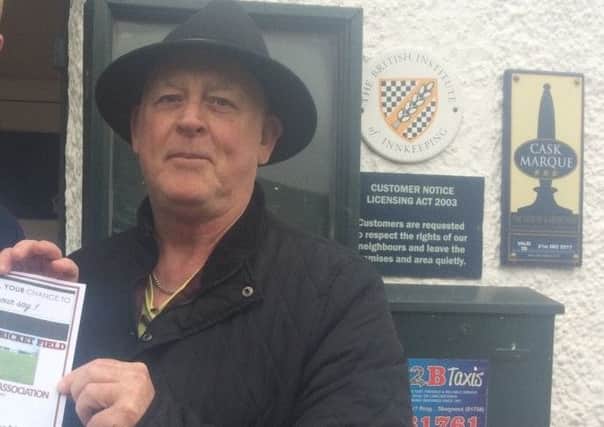 Save Burgh Cricket Field campaigner Dave Poole outside the Fleece Inn. ANL-170805-103831001