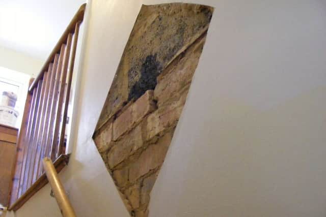 A big patch of plaster had to be removed on the stairway leaving bare brick. EMN-170428-112116001