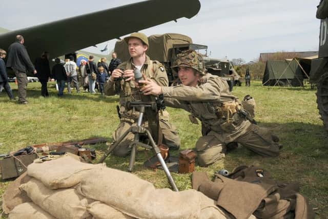 Last year's Metheringham Airfield 1940s wartime weekend. L-R Dale Harbron and Tom Powell, members of North West 101st Airbourne living history group. EMN-170428-173921001