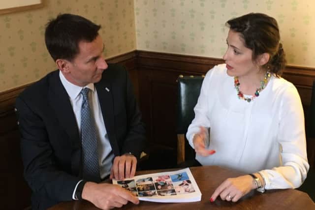 Victoria Atkins with the Secretary of State for Health, Jeremy Hunt.