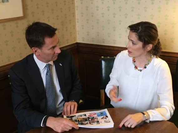Victoria Atkins with the Secretary of State for Health, Jeremy Hunt.