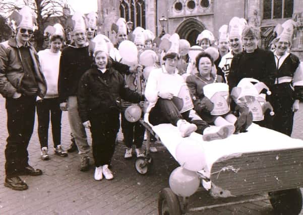 Can you name the characters in this charity bed push at St Denys' Church in Sleaford taken in 1992? EMN-170405-173755001