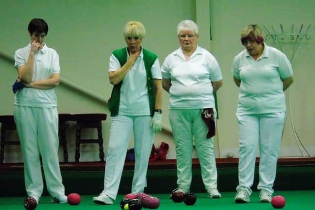 A tense moment in the Ladies' Triples.