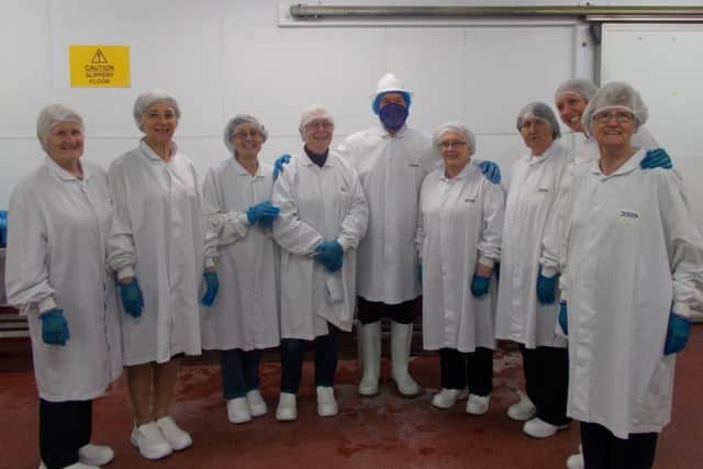 Members of Nettleton & Moortown WI donned white coats, shoes and hair nets for their visit Sea Lord EMN-170513-223252001