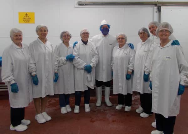 Members of Nettleton & Moortown WI donned white coats, shoes and hair nets for their visit Sea Lord EMN-170513-223252001