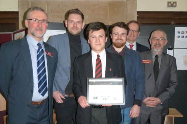 From left, Design and Technology teacher Neil Birch, James Lockwood, Thomas Mead, Rob Cook, teacher Graham Dobson and Design and Technology Technician Paul Hutson. (Lin) EMN-171005-073219001