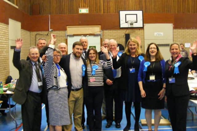 Conservatives celebrate a winning night at the county council election count in North Kesteven held at North Hykeham. EMN-170505-032928001
