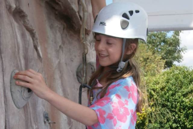 Have a go at the climbing wall at the Discovery day in Sleaford. EMN-170505-154215001