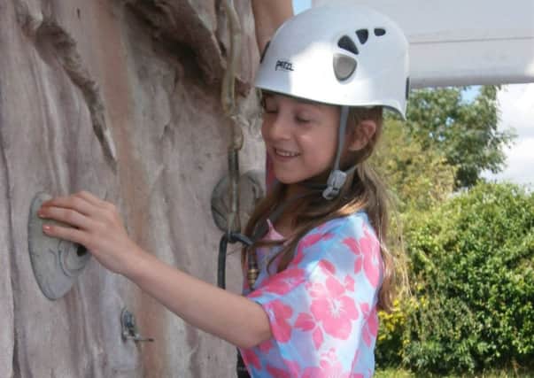 Have a go at the climbing wall at the Discovery day in Sleaford. EMN-170505-154215001