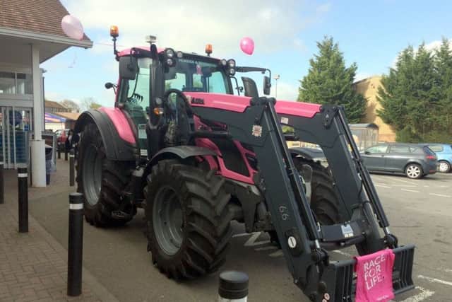 Pink tractor rasing awareness and cash for Breast Cancer Care EMN-170605-184644001