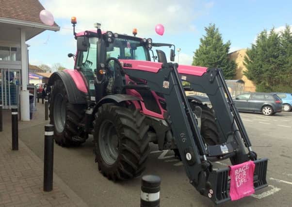 Pink tractor rasing awareness and cash for Breast Cancer Care EMN-170605-184644001
