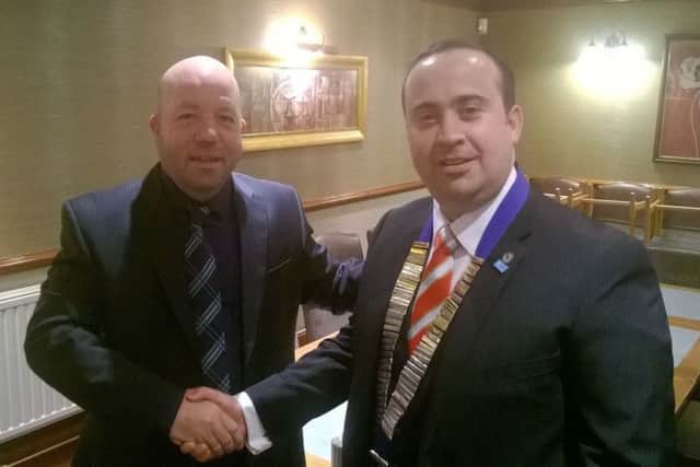 Outgoing chairman Martin Osborne hands over the chairman's chain to Steve Dawson. EMN-171105-131954001